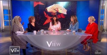 Roland mouret Bilt­more mid-rise silk-satin Ta­pered Trousers worn by Meghan McCain on The View January 30, 2020