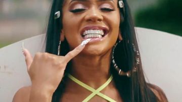 Silver bamboo hoop earrings of Saweetie in Saweetie - My Type (Official Video)