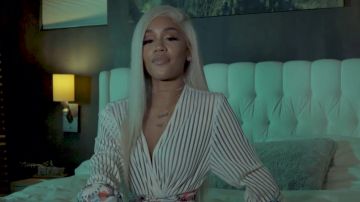 White and black striped robe of Saweetie in SAWEETIE - ICY GRL (Official Music Video)