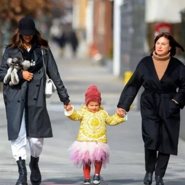 Burberry Lo­go De­tail Show­er­proof Trench Coat worn by Irina Shayk New York City January 30, 2020