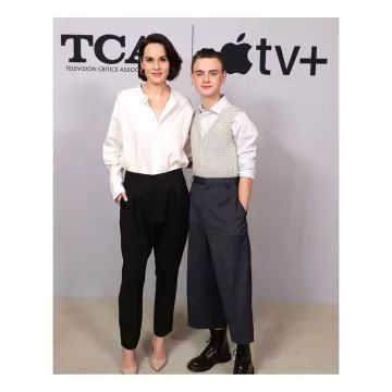Le pantalon à pinces noir de Michelle Dockery sur le compte Instagram de @theladydockers