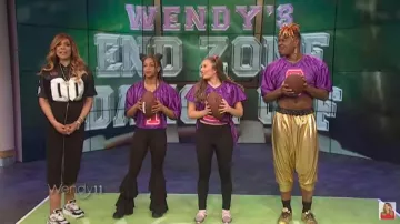 Alexander Wang Lo­go Jer­sey Top worn by Wendy Williams on The Wendy Williams Show January 31, 2020