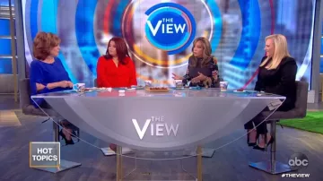 Rixo Flo­ral Print­ed Silk Mi­di Dress worn by Sunny Hostin on The View January 31, 2020