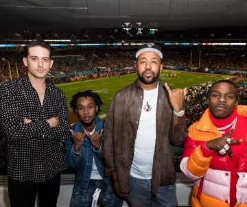 Burberry Orange Panelled Puffer Jacket of DaBaby on the Instagram account @g_eazy