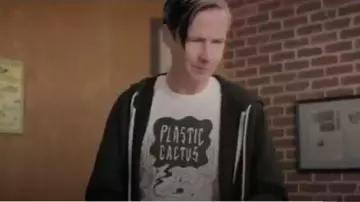 White Plastic Cactus T Shirt worn by Gabe Parrish (John Cameron Mitchell) in Shrill Season 2 Episode 6