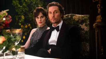 Black and purple velvet tuxedo jacket worn by Mickey Pearson (Matthew McConaughey) as seen in The Gentlemen