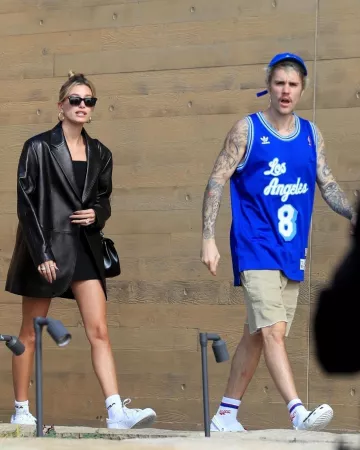 Saint Laurent Leather Blaz­er worn by Hailey Baldwin Nobu Malibu February 2, 2020