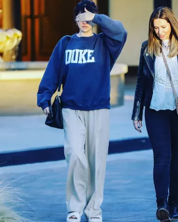 UGG Fuzz Yeah Gen­uine Shear­ling Slide worn by Selena Gomez Studio City February 1, 2020