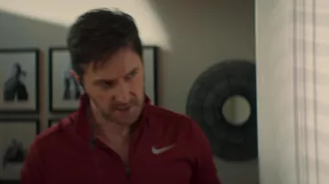 Nike zip sport jacket in red worn by Adam Price (Richard Armitage) as seen in The Stranger (S01E01)