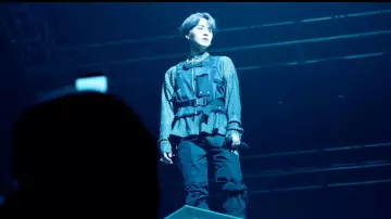 Knit Sweater with H Seam De­tail­ing worn by Suga in the music video BTS (방탄소년단) MAP OF THE SOUL : 7 'Interlude : Shadow' Comeback Trailer