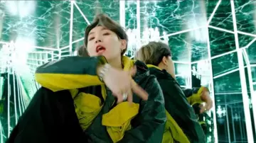 Gog­gle Hood Mil­i­tary Jack­et worn by Suga in the music video BTS (방탄소년단) MAP OF THE SOUL : 7 'Interlude : Shadow' Comeback Trailer