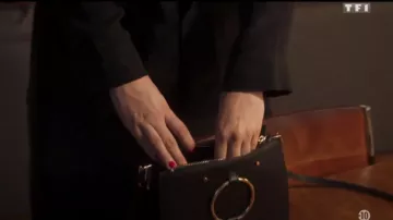 The leather Bag with ring metal Tiphaine (Florence Coste) in H24 (S01E01)