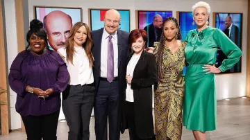 Sweet baby jamie Green Satin Mi­di Skirt worn by Brigitte Nielsen on The Talk February 5, 2020