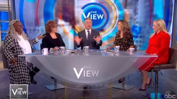 Ganni Flo­ral-print Crepe Wrap Dress worn by Sunny Hostin on The View February 5, 2020