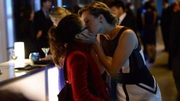 The red coat Diane von Furstenberg Cosima in Orphan Black
