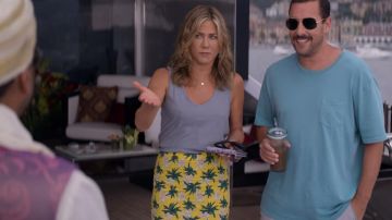 The skirt yellow palm trees as worn by Audrey Spitz (Jennifer Aniston) in Murder Mystery