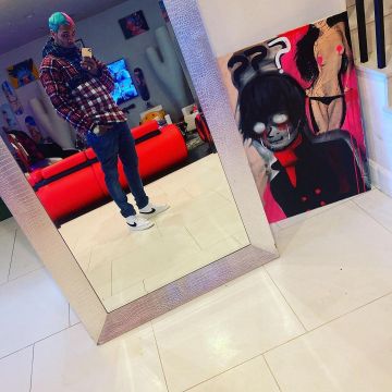 Dsquared2 Checked Print Hood­ie of Chris Brown on the Instagram account @chrisbrownofficial