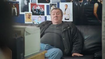 Chaqueta de cuero negro de Joe (Gregor Fisher) en Love Actually