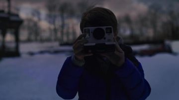 Polaroid Originals OneStep 2 white camera used by Bode Locke (Jackson Robert Scott) as seen in Locke & Key (S01E01)