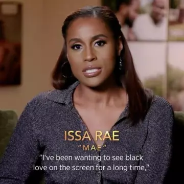 Camisa negra de cachemira Button Up usada por Issa Rae en la cuenta de Instagram @universalpictures