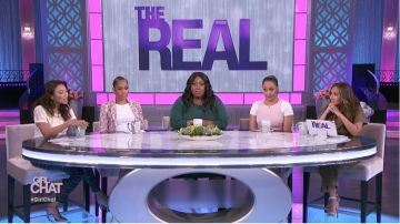 Nicholas Ru­mi Linen Jump­suit worn by Adrienne Bailon on The Real (2013) February 12, 2020
