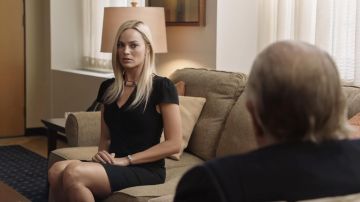 Black dress worn by Kayla Pospisil (Margot Robbie) as seen in Bombshell