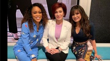 Ganni Blue Print­ed Silk Trousers worn by Eve on The Talk February 12, 2020