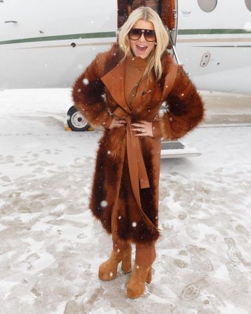Stella McCartney Belt­ed Veg­e­tar­i­an Leather And Faux Fur Coat worn by Jessica Simpson Instagram February 12, 2020
