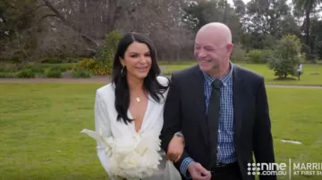 Pleat­ed Plunge Wrap Wed­ding Dress in Satin worn by Tash Herz in Married at First Sight Season 7