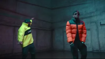 La doudoune orange Schott de Ninho dans le clip Gradur - BLH ft. Ninho (Clip officiel)