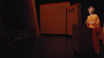 Orange long dress worn by J. K. L. Berensen (Tilda Swinton) as seen in The French Dispatch of the Liberty, Kansas Evening Sun