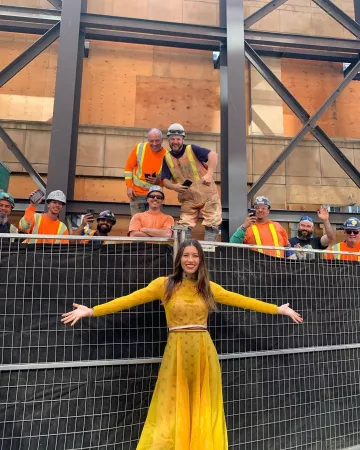 Fendi yellow dress worn by Jessica Biel on the Instagram account @jessicabiel