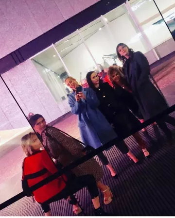 Light Blue Trench Coat worn by Poppy Delevingne on the Instagram account @caradelevingne