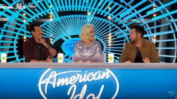 Jenny packham Lili Feath­er-Trimmed Se­quined Jump­suit worn by Katy Perry on American Idol February 16, 2020