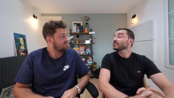 The t-shirt blue nike worn by Peter Croce in the video The photos of holiday the more sad