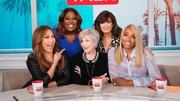 Karen kane Split Back Crossover Top worn by Sheryl Underwood on The Talk February 18, 2020