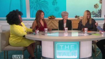 Black V-Neck Jump­suit worn by Carrie Ann Inaba on The Talk February 19, 2020