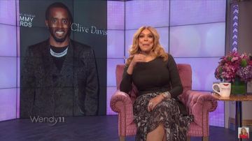 Tommy Hilfiger Snake Print Skirt worn by Wendy Williams on The Wendy Williams Show February 20, 2020