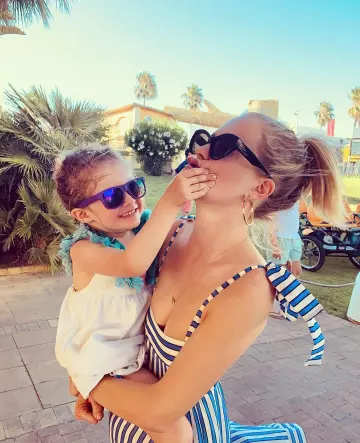Zimmermann Striped Tiered Maxi Dress worn by Poppy Delevingne on the Instagram account @poppydelevingne