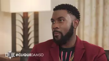 The black t-shirt with white stripes and red Damso in the video Click x Damso : everything went as planned (except the unexpected)