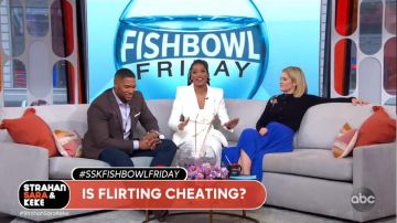 Alice + Olivia Asym­met­ri­cal Pleat­ed Mi­di Skirt worn by Sara Haines on Good Morning America February 21, 2020