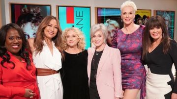 For love & lemons End­less Mi­ni Dress worn by Brigitte Nielsen on The Talk February 21, 2020