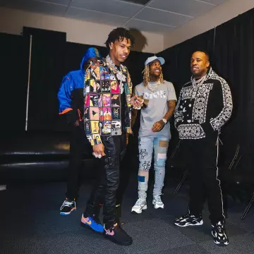 Louis vuitton Flo­ral Print Black 'LV Shape' Belt of Lil Baby on the Instagram account @yogotti