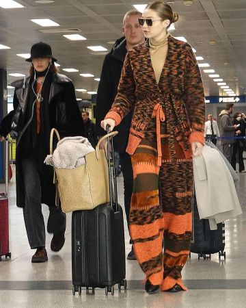 Vivienne westwood Dar­ius Chok­er worn by Bella Hadid Milan Linate Airport February 23, 2020