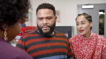 The Red Ruffle-trimmed floral-print blouse of Rainbow Johnson (Tracee Ellis Ross) in black-ish (S06E17)