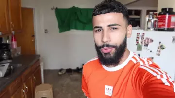 Orange adidas Skateboarding long sleeve top worn by Adam Saleh in Reacting To James Charles Reacting To Me Getting Pranked!!!