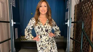 Influence Wrap Front Satin Mi­di dress worn by Carrie Ann Inaba on The Talk February 26, 2020