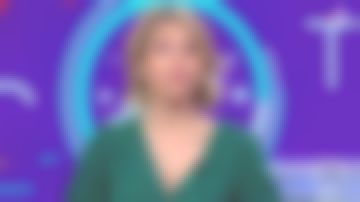 The dress midi portfolio V-neck printed Green Laura Tenoudji in Télématin the 27.02.2020