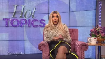 LaQuan Smith Kendall Wrap Skirt worn by Wendy Williams as seen in The Wendy Williams Show February 27, 2020