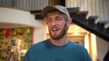 Plain grey baseball cap of Logan Paul in Dating My Brother’s Ex-Wife...